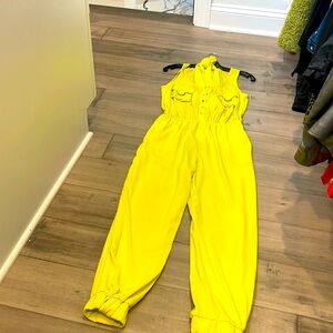 Bebe , bright yellow jumpsuit. W/elastic waist band sm